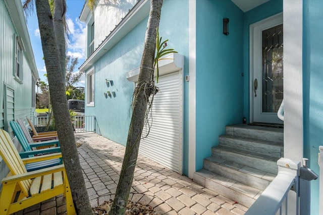 10851 S Ocean Dr Unit 84, Jensen Beach, FL 34957 - property entrance featuring stucco siding