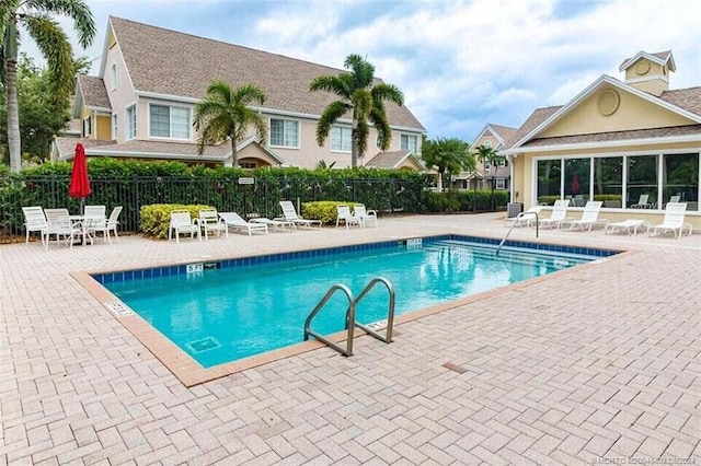 1595 SE Pomeroy St, Stuart, FL 34997 - community pool featuring a patio
