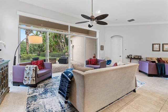 102 Andalusia Way, Palm Beach Gardens, FL 33418 - living area featuring arched walkways, ceiling fan, crown molding, and light tile patterned floors