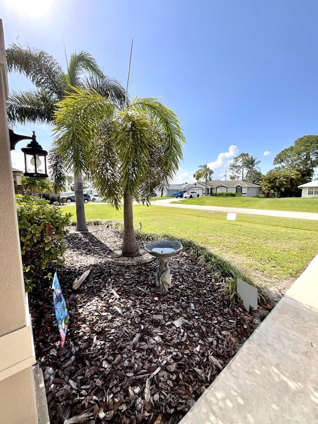 1206 SW Bargello Ave SW, Port Saint Lucie, FL 34953 - view of green lawn