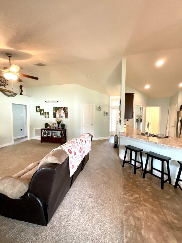 1206 SW Bargello Ave SW, Port Saint Lucie, FL 34953 - living area featuring a ceiling fan, baseboards, dark colored carpet, recessed lighting, and vaulted ceiling