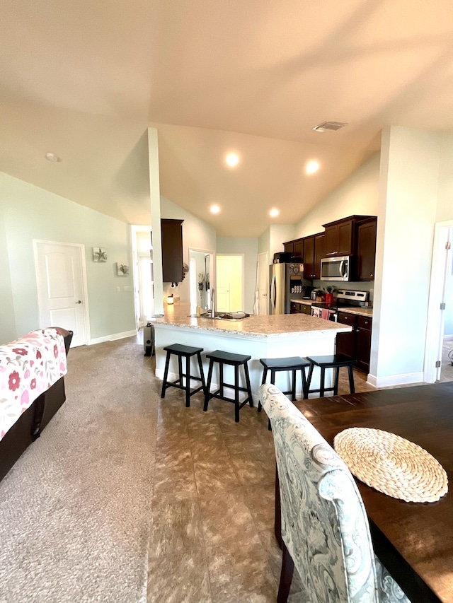 1206 SW Bargello Ave SW, Port Saint Lucie, FL 34953 - dining space with vaulted ceiling and baseboards