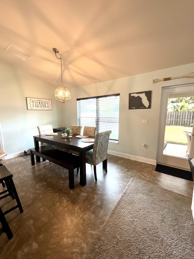 1206 SW Bargello Ave SW, Port Saint Lucie, FL 34953 - dining space featuring baseboards and lofted ceiling