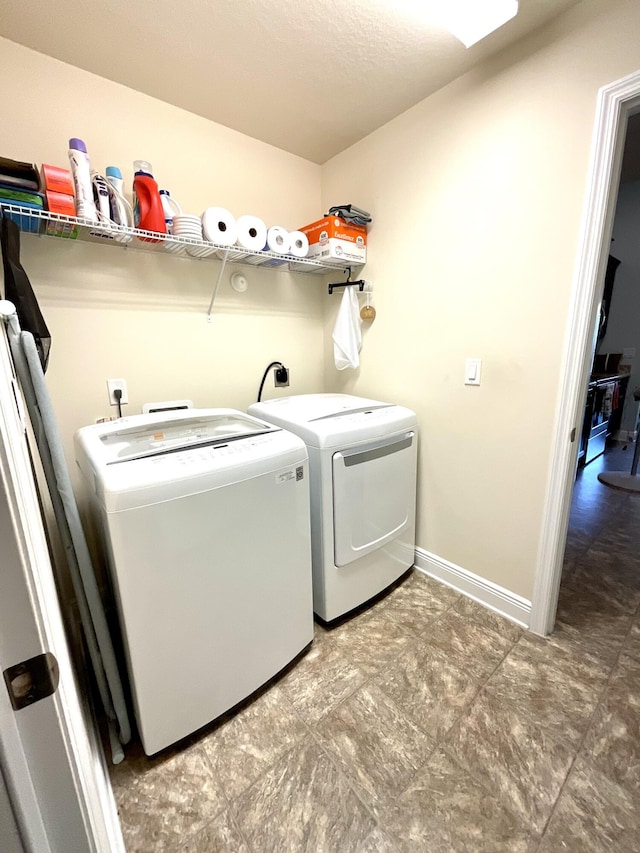 1206 SW Bargello Ave SW, Port Saint Lucie, FL 34953 - laundry area featuring independent washer and dryer and baseboards