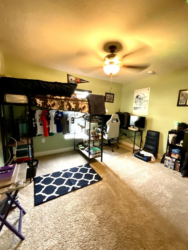 1206 SW Bargello Ave SW, Port Saint Lucie, FL 34953 - carpeted bedroom with a desk, baseboards, and ceiling fan