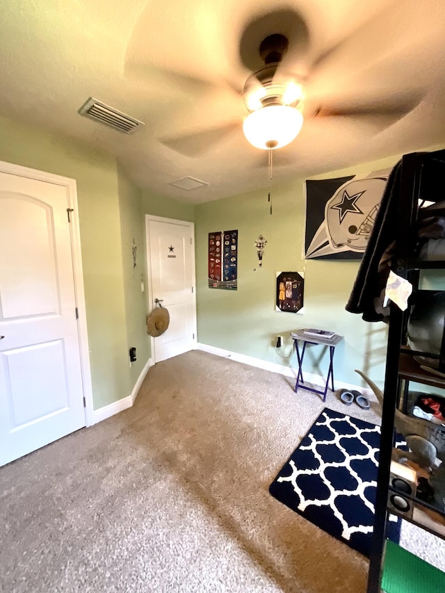 1206 SW Bargello Ave SW, Port Saint Lucie, FL 34953 - recreation room with carpet, baseboards, and ceiling fan