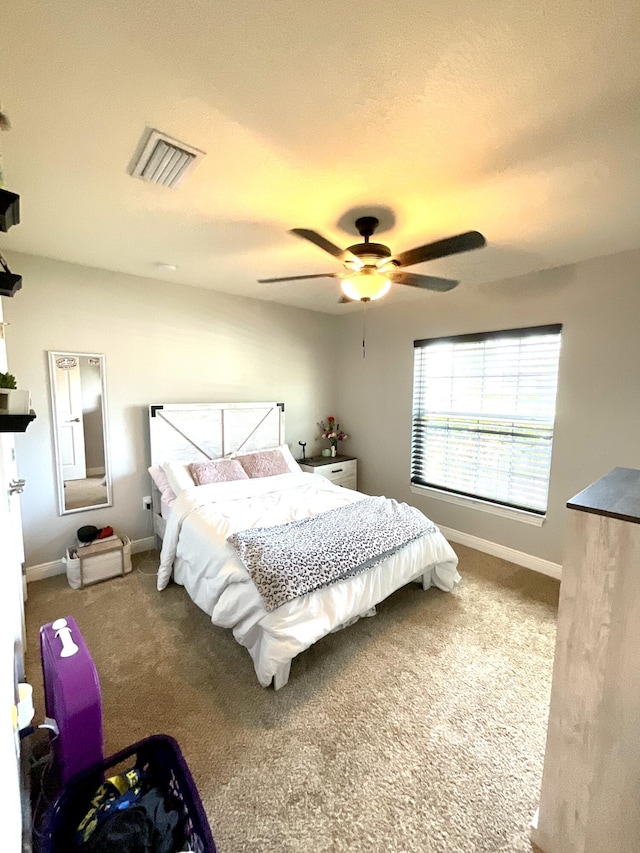 1206 SW Bargello Ave SW, Port Saint Lucie, FL 34953 - carpeted bedroom featuring baseboards and a ceiling fan