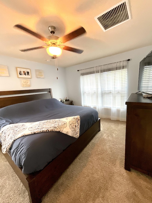 1206 SW Bargello Ave SW, Port Saint Lucie, FL 34953 - bedroom featuring carpet flooring and a ceiling fan
