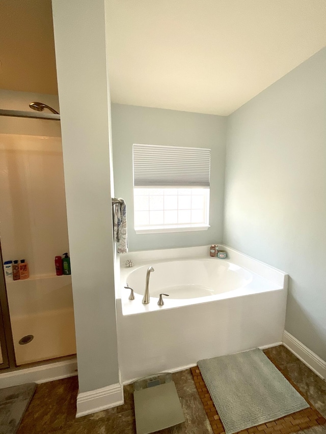 1206 SW Bargello Ave SW, Port Saint Lucie, FL 34953 - full bathroom featuring a garden tub and a stall shower