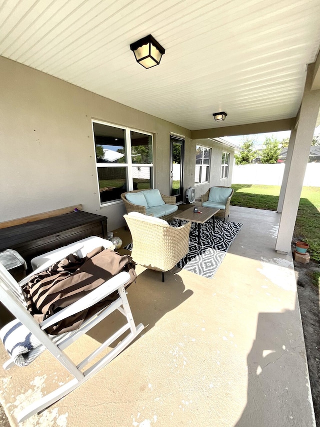 1206 SW Bargello Ave SW, Port Saint Lucie, FL 34953 - view of patio / terrace with outdoor lounge area