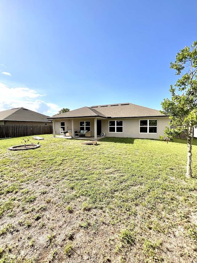 1206 SW Bargello Ave SW, Port Saint Lucie, FL 34953 - back of house with a patio and stucco siding