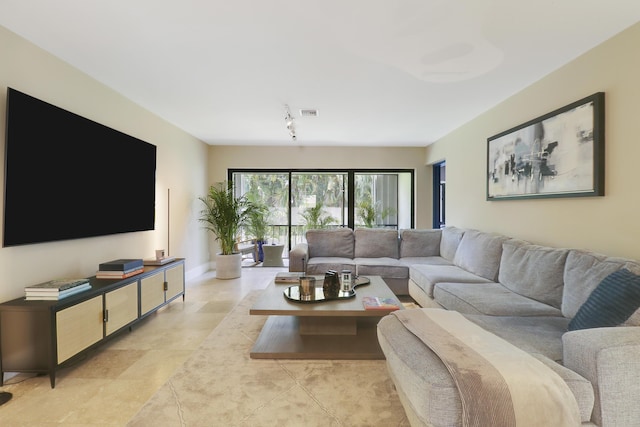 1700 Presidential Way Unit 201, West Palm Beach, FL 33401 - living room featuring track lighting