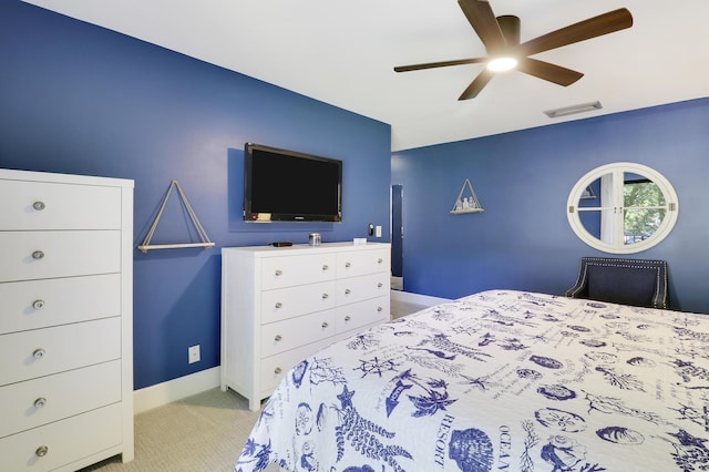 1700 Presidential Way Unit 201, West Palm Beach, FL 33401 - bedroom featuring light carpet, baseboards, and ceiling fan
