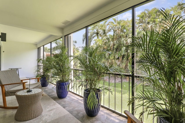 1700 Presidential Way Unit 201, West Palm Beach, FL 33401 - sunroom with beamed ceiling