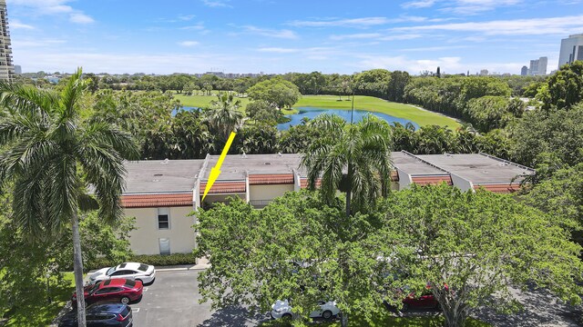 1700 Presidential Way Unit 201, West Palm Beach, FL 33401 - bird's eye view of a nearby body of water, a golf club, and a tree filled landscape