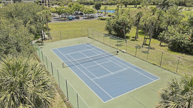 1700 Presidential Way Unit 201, West Palm Beach, FL 33401 - view of tennis court featuring a water view