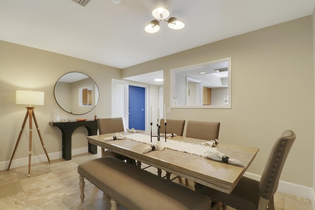 1700 Presidential Way Unit 201, West Palm Beach, FL 33401 - dining space featuring baseboards
