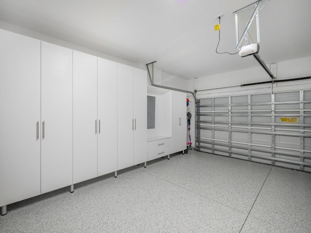 9817 SW Isabelline Dr, Port Saint Lucie, FL 34987 - garage featuring a garage door opener