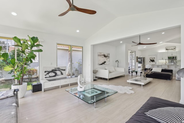13853 Palm Grove Pl, West Palm Beach, FL 33418 - living area featuring a ceiling fan, vaulted ceiling, recessed lighting, and light wood-style floors