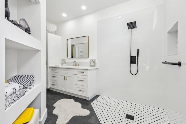 13853 Palm Grove Pl, West Palm Beach, FL 33418 - bathroom featuring a tile shower, vanity, recessed lighting, and tile patterned flooring
