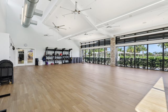13853 Palm Grove Pl, West Palm Beach, FL 33418 - workout area featuring high vaulted ceiling, a ceiling fan, and wood finished floors