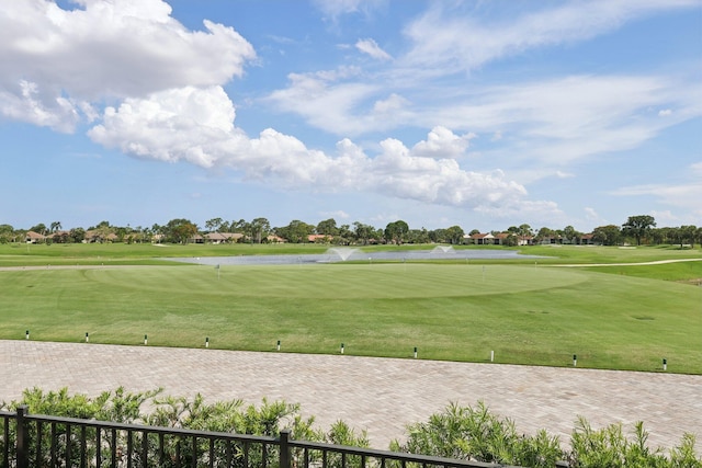 13853 Palm Grove Pl, West Palm Beach, FL 33418 - surrounding community featuring view of golf course, a yard, and a water view