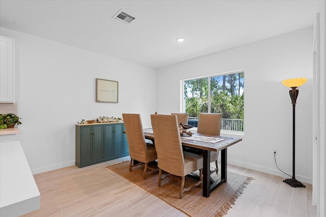 821 NE Trailside Run, Port Saint Lucie, FL 34983 - dining room featuring light wood-style floors, recessed lighting, and baseboards