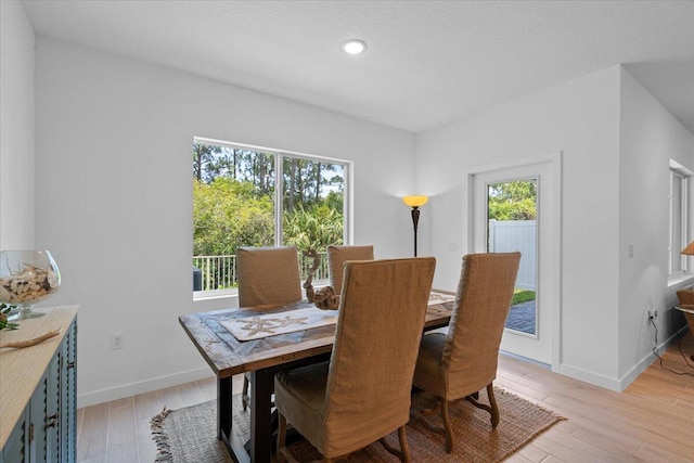 821 NE Trailside Run, Port Saint Lucie, FL 34983 - dining area featuring plenty of natural light, light wood finished floors, baseboards, and recessed lighting