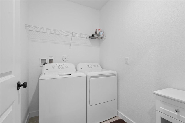 821 NE Trailside Run, Port Saint Lucie, FL 34983 - laundry room with independent washer and dryer and baseboards