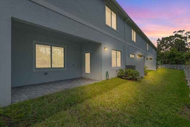 821 NE Trailside Run, Port Saint Lucie, FL 34983 - rear view of house featuring stucco siding and a patio area