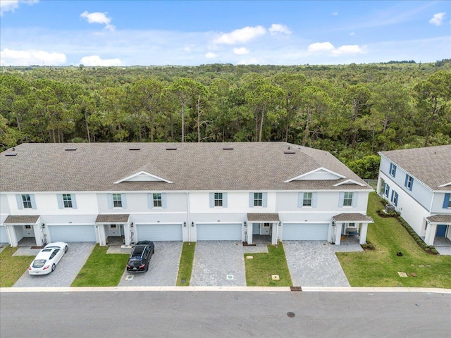 821 NE Trailside Run, Port Saint Lucie, FL 34983 - view of subject property with a heavily wooded area