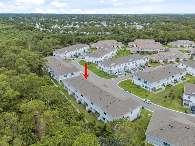 821 NE Trailside Run, Port Saint Lucie, FL 34983 - aerial view of residential area featuring a forest