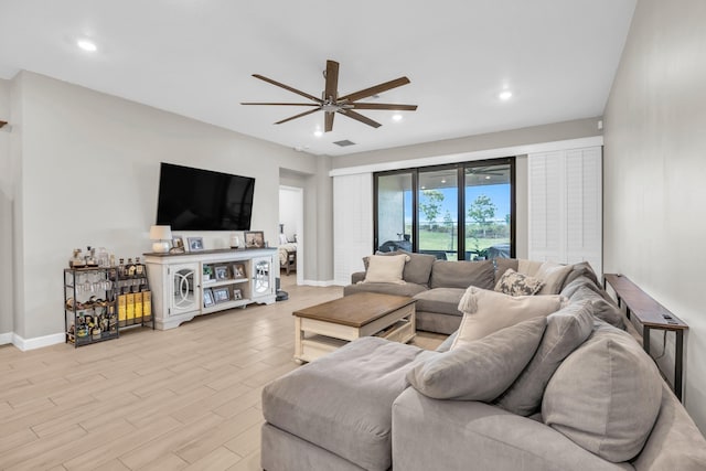 1246 Tangled Orchard Trce, Loxahatchee, FL 33470 - living area featuring ceiling fan, baseboards, light wood-type flooring, and recessed lighting