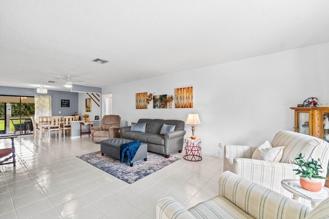 4260 Mango Tree Ct Unit B, Boynton Beach, FL 33436 - tiled living room with ceiling fan and a textured ceiling