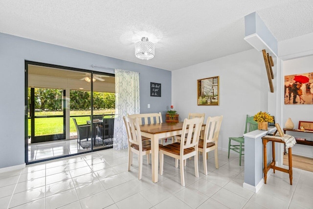 4260 Mango Tree Ct Unit B, Boynton Beach, FL 33436 - dining space with a textured ceiling and baseboards
