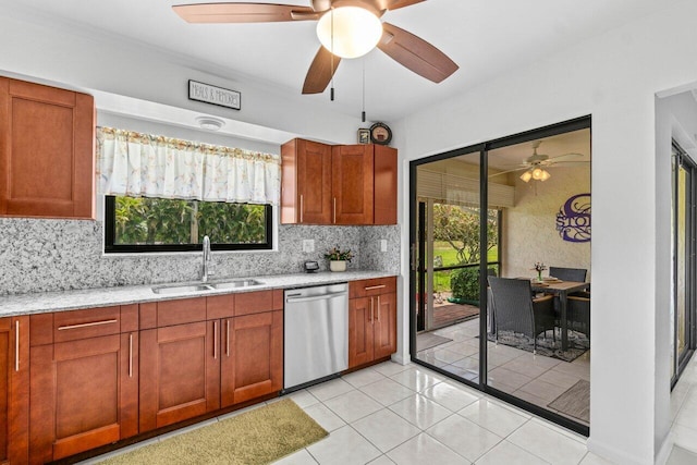 4260 Mango Tree Ct Unit B, Boynton Beach, FL 33436 - kitchen featuring dishwasher, a sink, a ceiling fan, tasteful backsplash, and light stone countertops