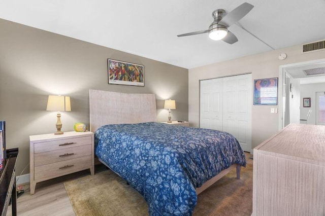4051 Guildford C Unit 4051, Boca Raton, FL 33434 - bedroom featuring a closet, wood finished floors, ceiling fan, and baseboards