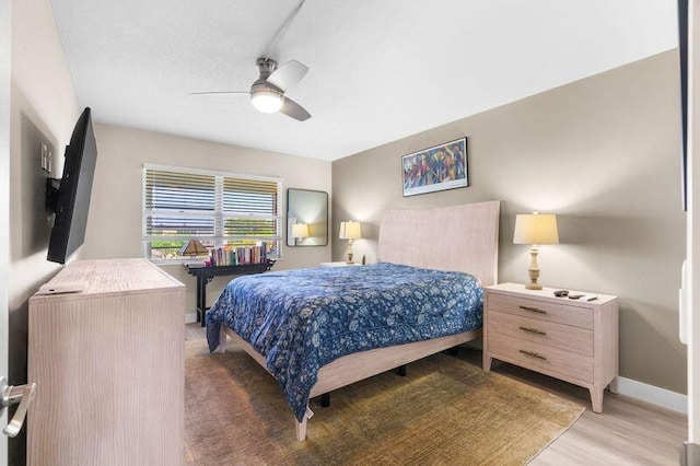4051 Guildford C Unit 4051, Boca Raton, FL 33434 - bedroom featuring light wood finished floors, baseboards, and a ceiling fan