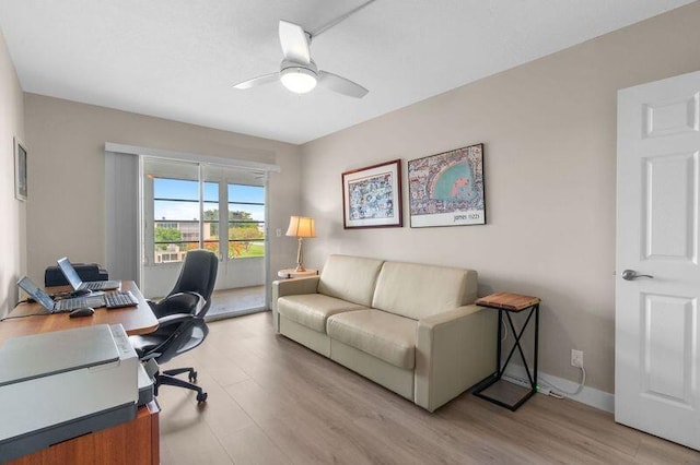 4051 Guildford C Unit 4051, Boca Raton, FL 33434 - home office featuring light wood-style flooring, a ceiling fan, and baseboards