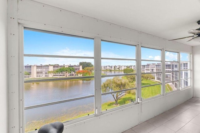 4051 Guildford C Unit 4051, Boca Raton, FL 33434 - unfurnished sunroom featuring a water view and plenty of natural light