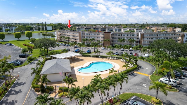 4051 Guildford C Unit 4051, Boca Raton, FL 33434 - aerial view of a pool area, apartment complex / building, and a large body of water