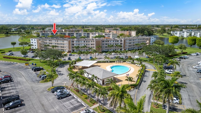 4051 Guildford C Unit 4051, Boca Raton, FL 33434 - bird's eye view of a nearby body of water, apartment complex, and a pool area