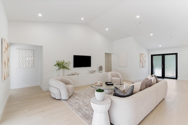 3099 NW 25th Way, Boca Raton, FL 33434 - living room featuring high vaulted ceiling, light wood-style flooring, and recessed lighting