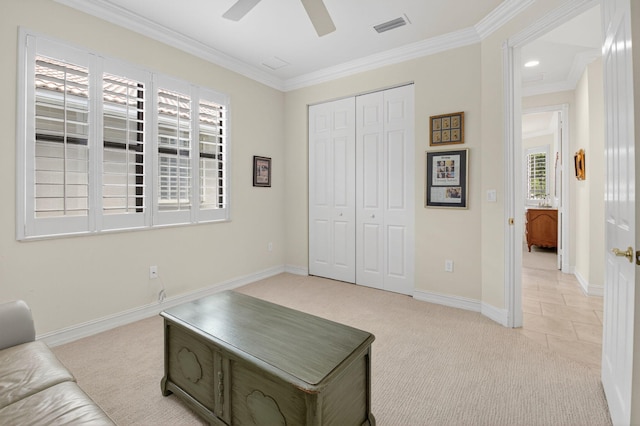 7030 Boscanni Dr Unit 7030, Boynton Beach, FL 33437 - living area featuring light carpet, plenty of natural light, crown molding, ceiling fan, and baseboards