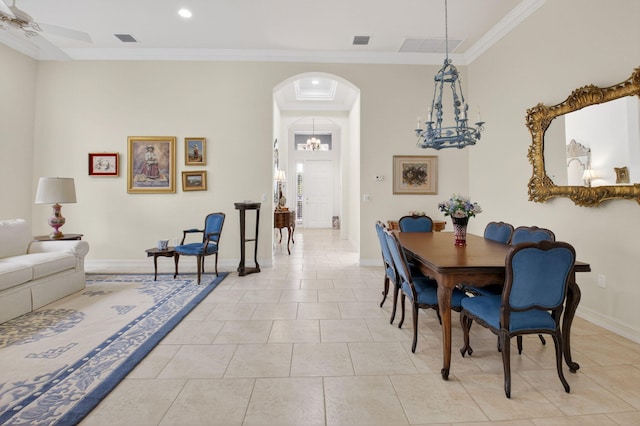 7030 Boscanni Dr Unit 7030, Boynton Beach, FL 33437 - dining space featuring arched walkways, crown molding, baseboards, light tile patterned flooring, and recessed lighting