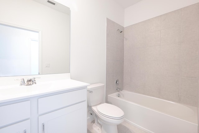 242 SE Woodbark St, Port Saint Lucie, FL 34984 - full bath with toilet, vanity, shower / bath combination, and tile patterned floors