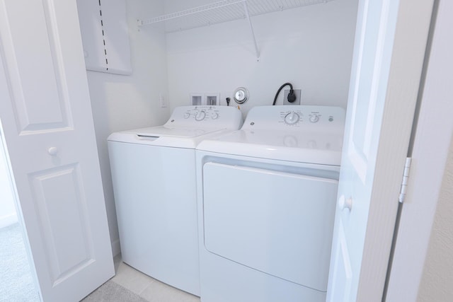 242 SE Woodbark St, Port Saint Lucie, FL 34984 - washroom featuring washing machine and dryer and electric panel