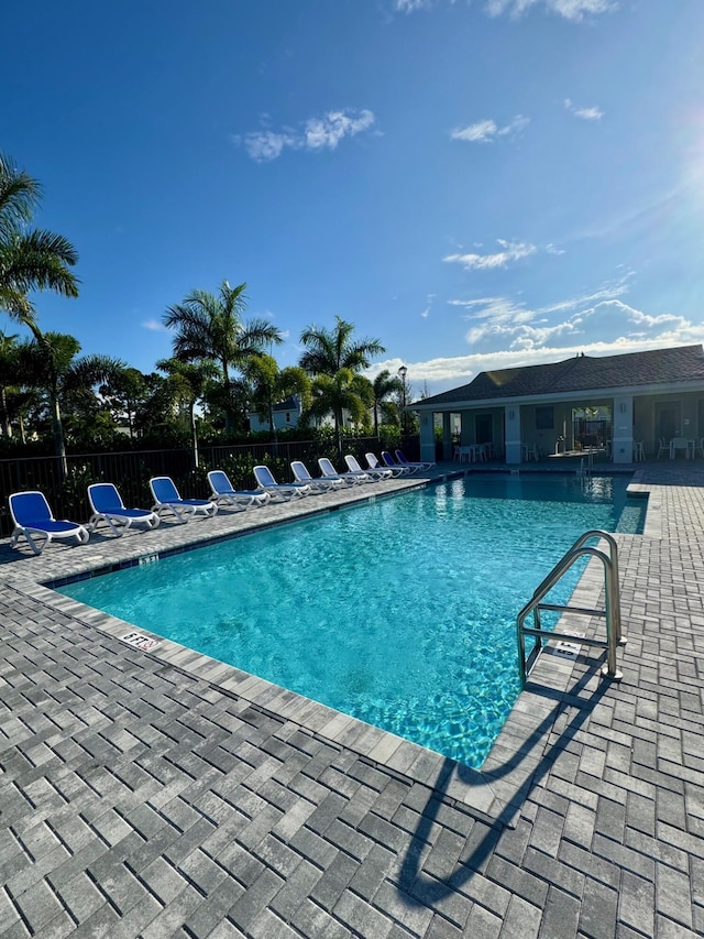 242 SE Woodbark St, Port Saint Lucie, FL 34984 - community pool featuring a patio area