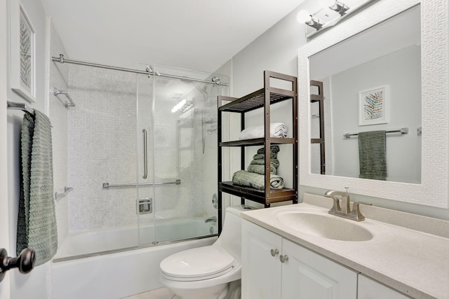 2731 NE 14th Cswy Unit 702, Pompano Beach, FL 33062 - bathroom featuring bath / shower combo with glass door, toilet, and vanity