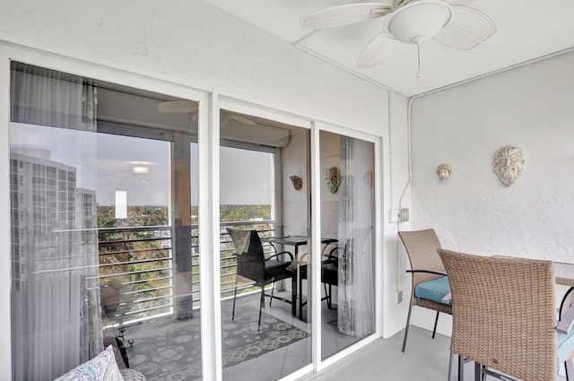 2731 NE 14th Cswy Unit 702, Pompano Beach, FL 33062 - sunroom / solarium featuring a ceiling fan